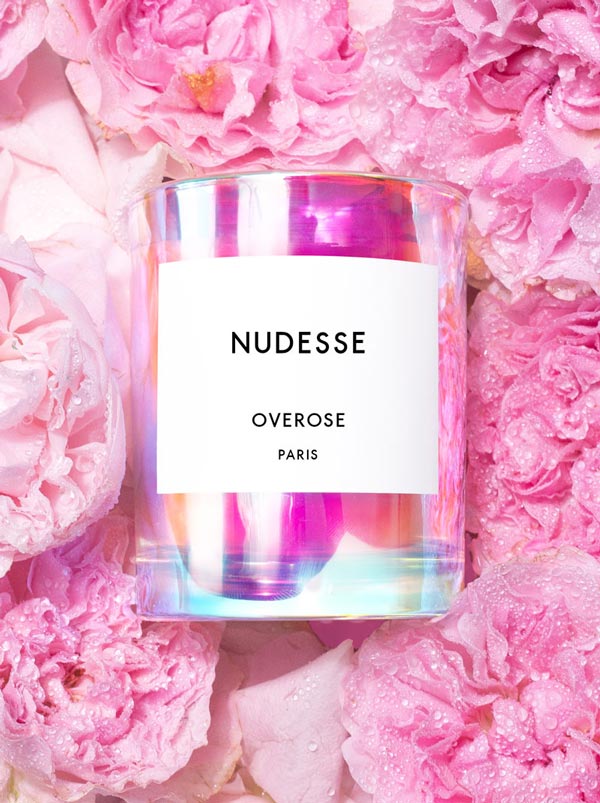 Overose Nudesse holographic iridescent scented candle features fragrance notes of Roses and Rain.