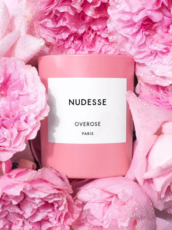 Overose Nudesse scented candle features fragrance notes of Rose and Rain.